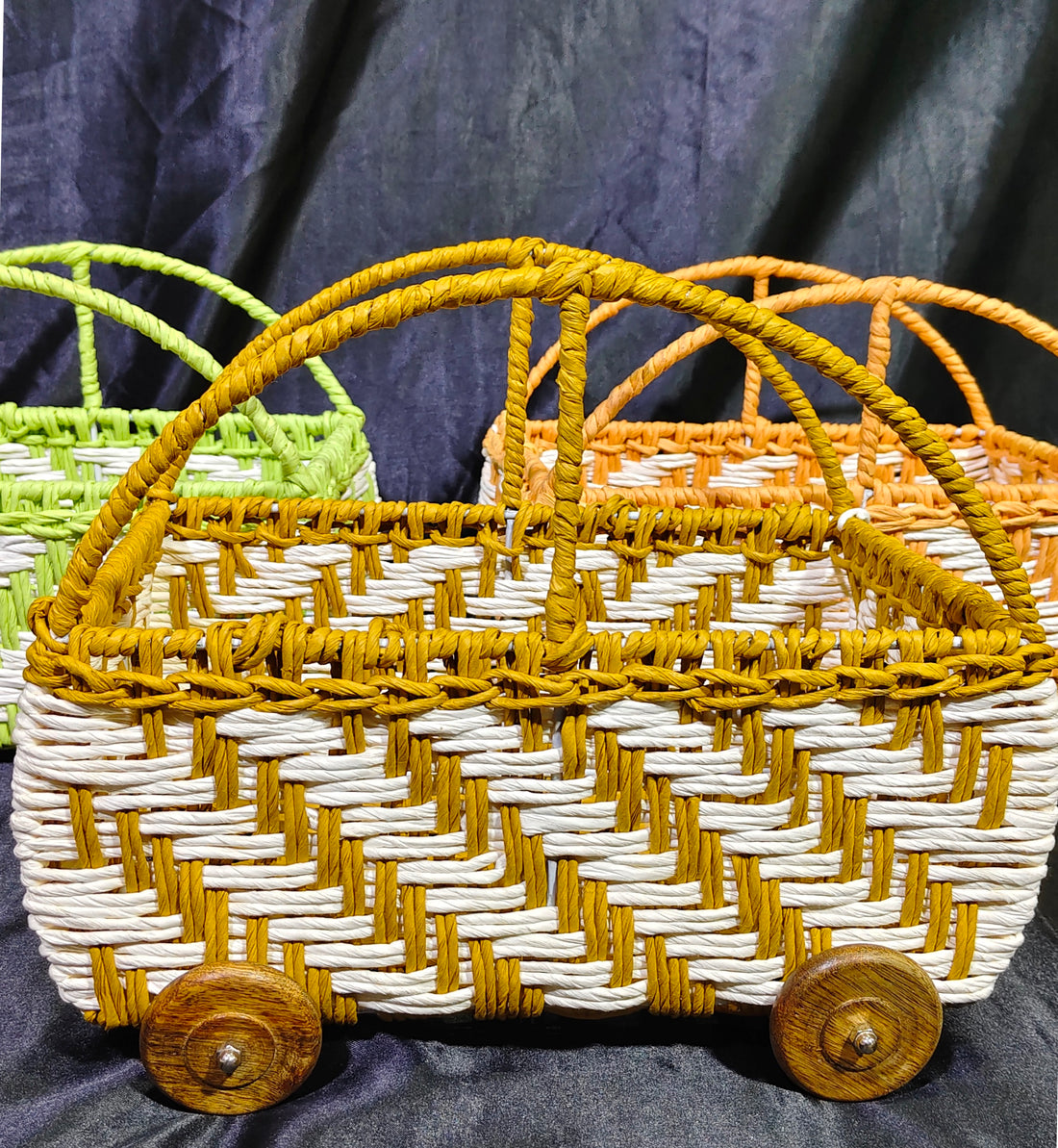 METAL COLOURFU;L HANDWEAVED CART WITH WOOD WHEELS - 3 COLOUR OPTIONS